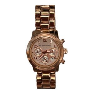 Rose gold Michael Kors watch needs batteries